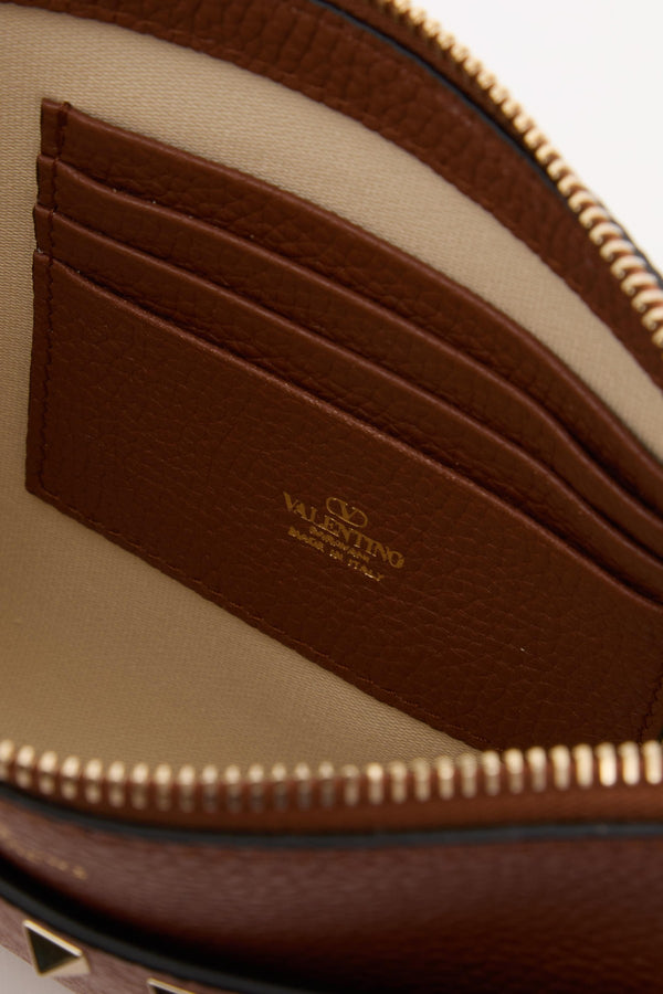 POUCH ROCKSTUD IN VITELLO GRANATO