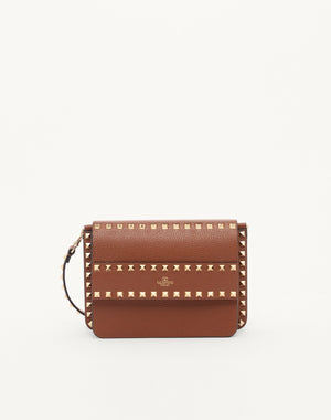 BORSA PICCOLA A TRACOLLA ROCKSTUD IN VITELLO GRANATO