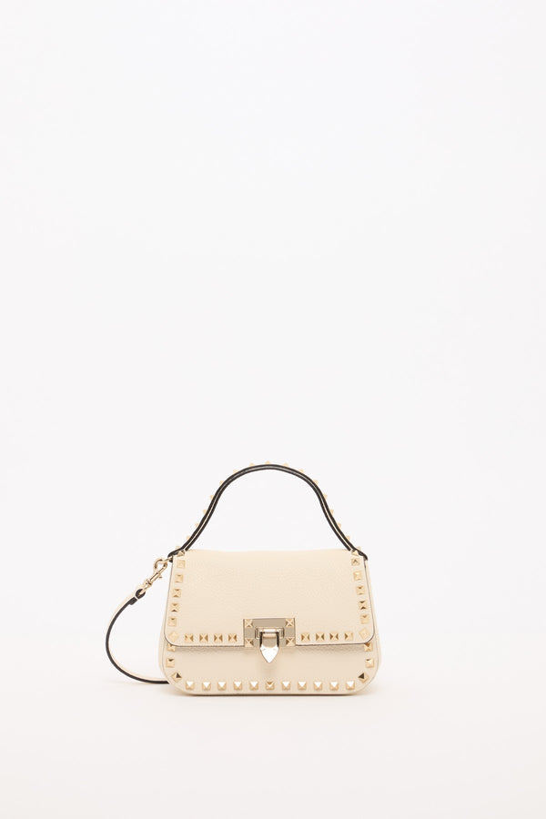 BORSA PICCOLA A MANO ROCKSTUD IN VITELLO GRANATO