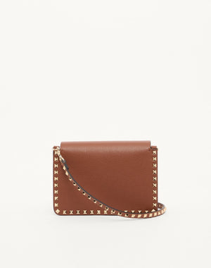 BORSA PICCOLA A TRACOLLA ROCKSTUD IN VITELLO GRANATO
