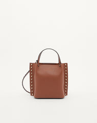 BORSA SHOPPING PICCOLA ROCKSTUD IN VITELLO GRANATO