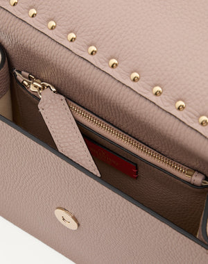 BORSA PICCOLA A TRACOLLA ROCKSTUD IN VITELLO GRANATO