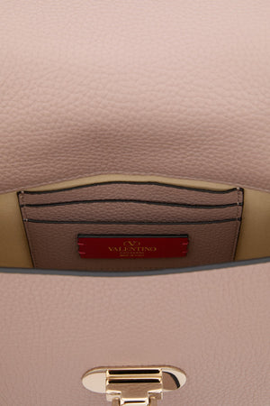 BORSA PICCOLA A MANO ROCKSTUD IN VITELLO GRANATO