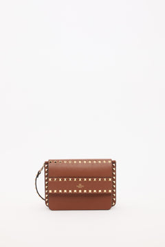 BORSA PICCOLA A TRACOLLA ROCKSTUD IN VITELLO GRANATO