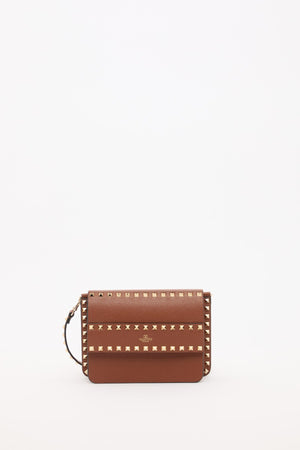 BORSA PICCOLA A TRACOLLA ROCKSTUD IN VITELLO GRANATO