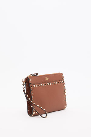 POUCH ROCKSTUD IN VITELLO GRANATO