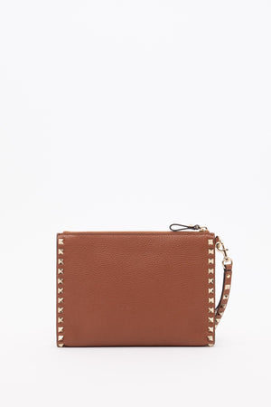 POUCH ROCKSTUD IN VITELLO GRANATO