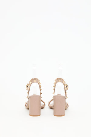 SANDALO ROCKSTUD IN VITELLO GRANATO CON CINTURINO 80MM