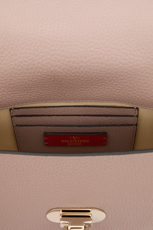 BORSA PICCOLA A MANO ROCKSTUD IN VITELLO GRANATO