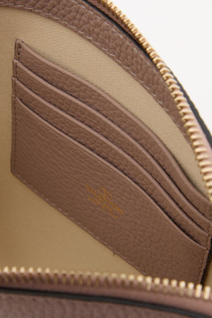 POUCH ROCKSTUD IN VITELLO GRANATO