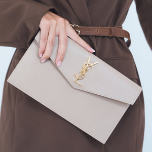 Uptown Grain de Poudre Embossed Leather Clutch