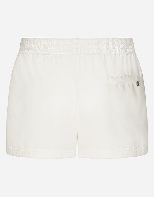 SHORT SWIM TRUNKS WITH BRANDED TAG
