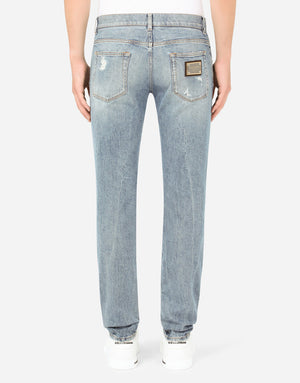BLUE WASH SKINNY STRETCH JEANS WITH RIPS