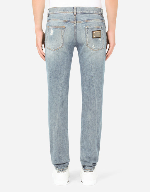 BLUE WASH SKINNY STRETCH JEANS WITH RIPS