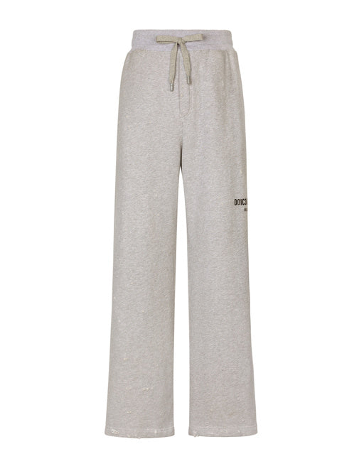 PRINTED JOGGING PANTS WITH SMALL ABRASIONS