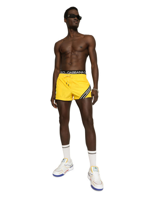 SHORT SWIM TRUNKS WITH BRANDED BAND