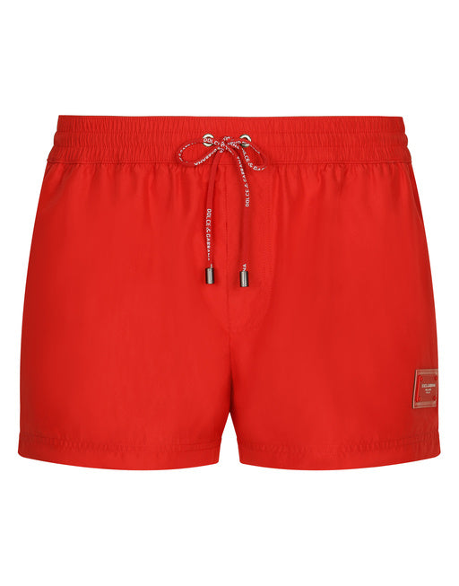 SHORT SWIM TRUNKS WITH BRANDED PLATE