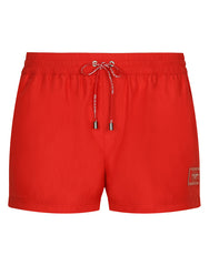 SHORT SWIM TRUNKS WITH BRANDED PLATE