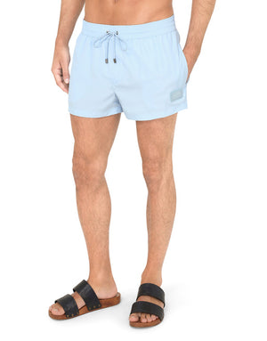 SHORT SWIM TRUNKS WITH BRANDED PLATE