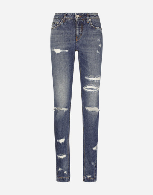 GIRLY JEANS WITH RIPPED DETAILS