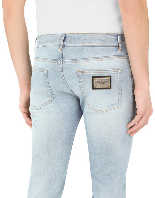 LIGHT BLUE SKINNY STRETCH JEANS WITH RIPS