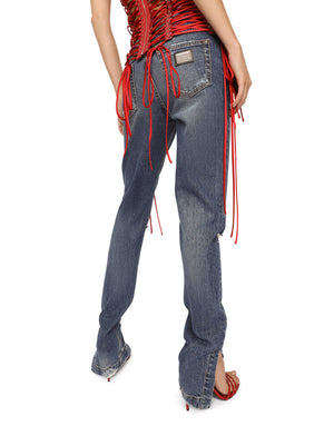 GIRLY JEANS WITH RIPPED DETAILS