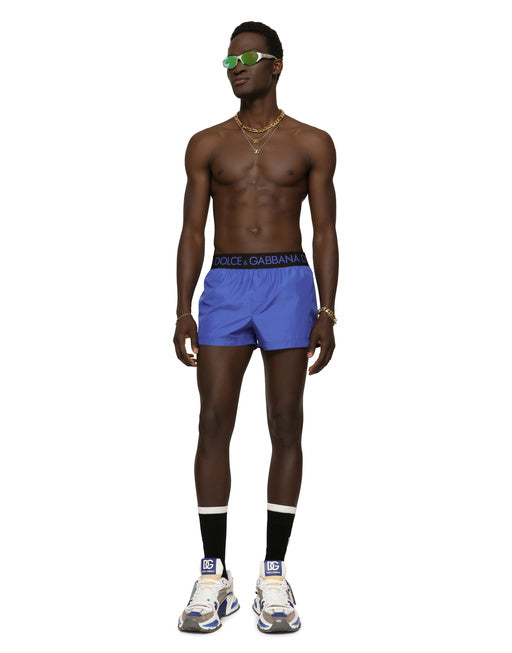 SHORT SWIM TRUNKS WITH BRANDED STRETCH WAISTBAND