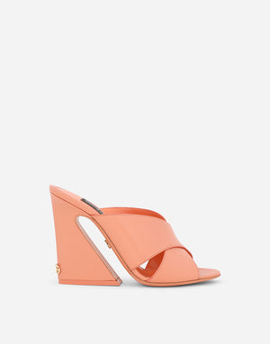 CALFSKIN MULES WITH GEOMETRIC HEEL
