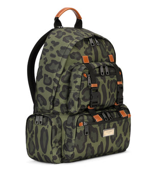 NYLON BACKPACK WITH LEOPARD PRINT AGAINST A GREEN BACKGROUND AND BRANDED PLATE