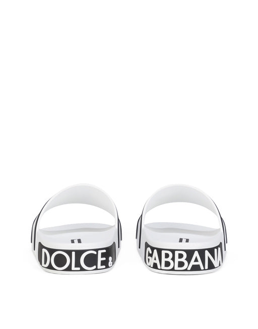 RUBBER BEACHWEAR SLIDERS WITH HIGH-FREQUENCY DETAILING