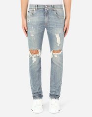 BLUE WASH SKINNY STRETCH JEANS WITH RIPS