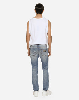 LIGHT BLUE STRETCH SKINNY JEANS WITH RIPS