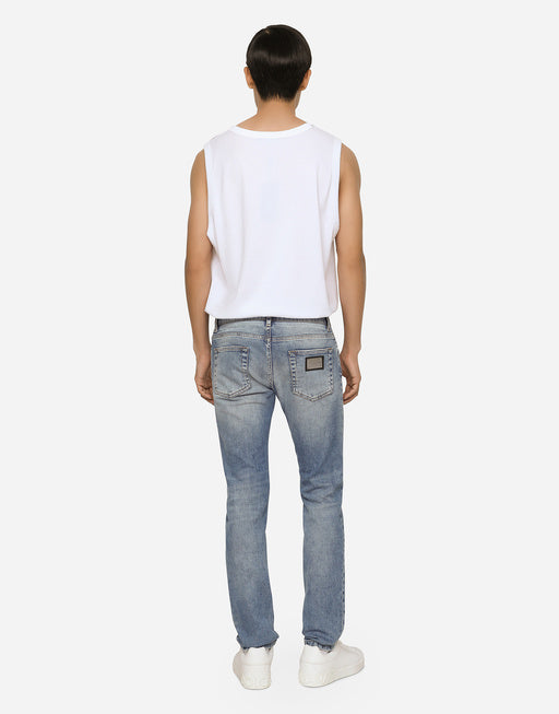 LIGHT BLUE STRETCH SKINNY JEANS WITH RIPS
