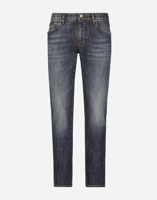 SLIM FIT WASHED STRETCH JEANS WITH SUBTLE ABRASIONS