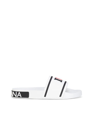 RUBBER BEACHWEAR SLIDERS WITH HIGH-FREQUENCY DETAILING