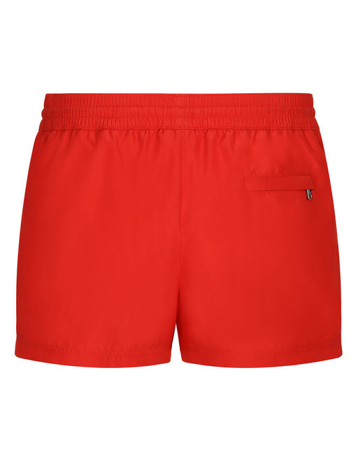 SHORT SWIM TRUNKS WITH BRANDED PLATE