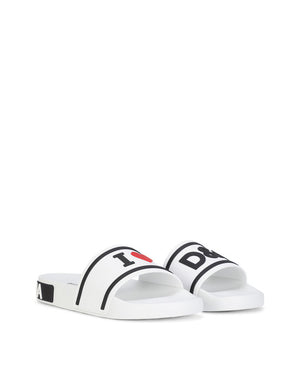 RUBBER BEACHWEAR SLIDERS WITH HIGH-FREQUENCY DETAILING