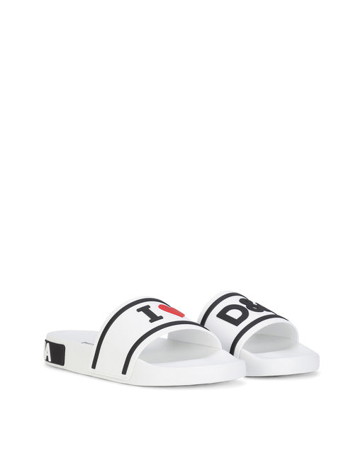 RUBBER BEACHWEAR SLIDERS WITH HIGH-FREQUENCY DETAILING