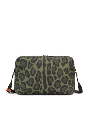 NYLON MESSENGER BAG WITH A LEOPARD PRINT AGAINST A GREEN BACKGROUND AND BRANDED PLATE