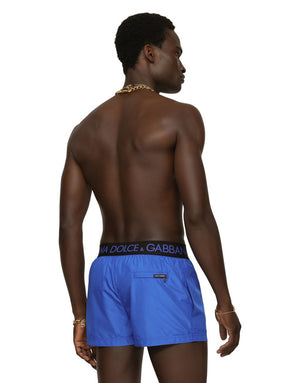 SHORT SWIM TRUNKS WITH BRANDED STRETCH WAISTBAND