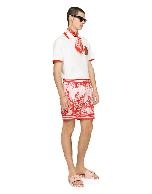 CORAL-PRINT SILK SCARF WITH PINK BACKGROUND