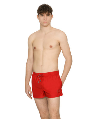 SHORT SWIM TRUNKS WITH BRANDED PLATE
