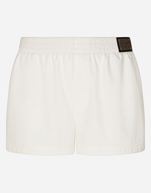 SHORT SWIM TRUNKS WITH BRANDED TAG