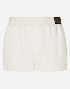 SHORT SWIM TRUNKS WITH BRANDED TAG