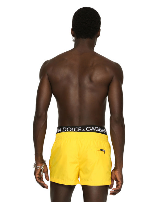 SHORT SWIM TRUNKS WITH BRANDED BAND