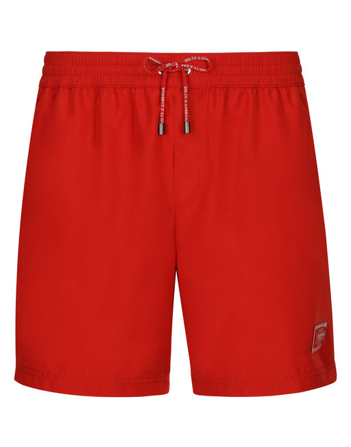 MID-LENGTH SWIM TRUNKS WITH BRANDED PLATE