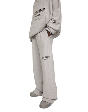 PRINTED JOGGING PANTS WITH SMALL ABRASIONS