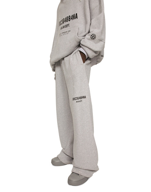 PRINTED JOGGING PANTS WITH SMALL ABRASIONS